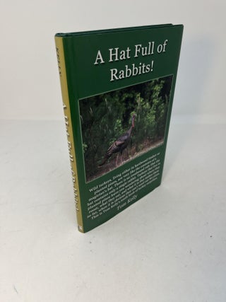 Item #29437 A HAT FULL OF RABBITS. (signed). Tom Kelly